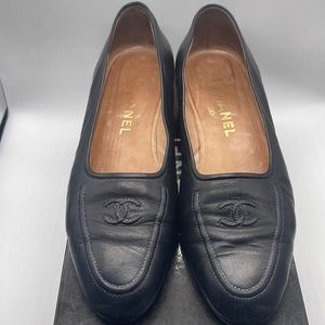 Chanel navy blue loafers, size 9.5, in good condition.